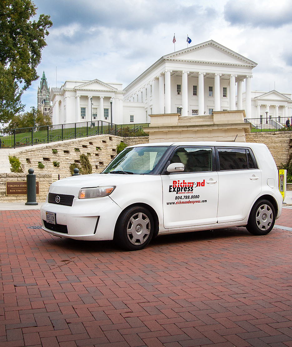 A Richmond Express van parked in front of the Virginia state capitol